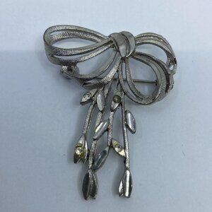 Vtg Avon de Belleville Boucher # 2593 brushed silver tone rhinestone bow  brooch